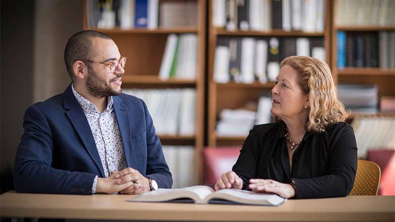 Joel Pugh, MBA'20, past recipient of a Heller Diversity and Inclusion Scholarship, with MBA Program Director Carole Carlson