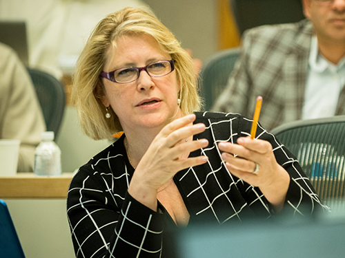 Image of an EMBA student in the classroom